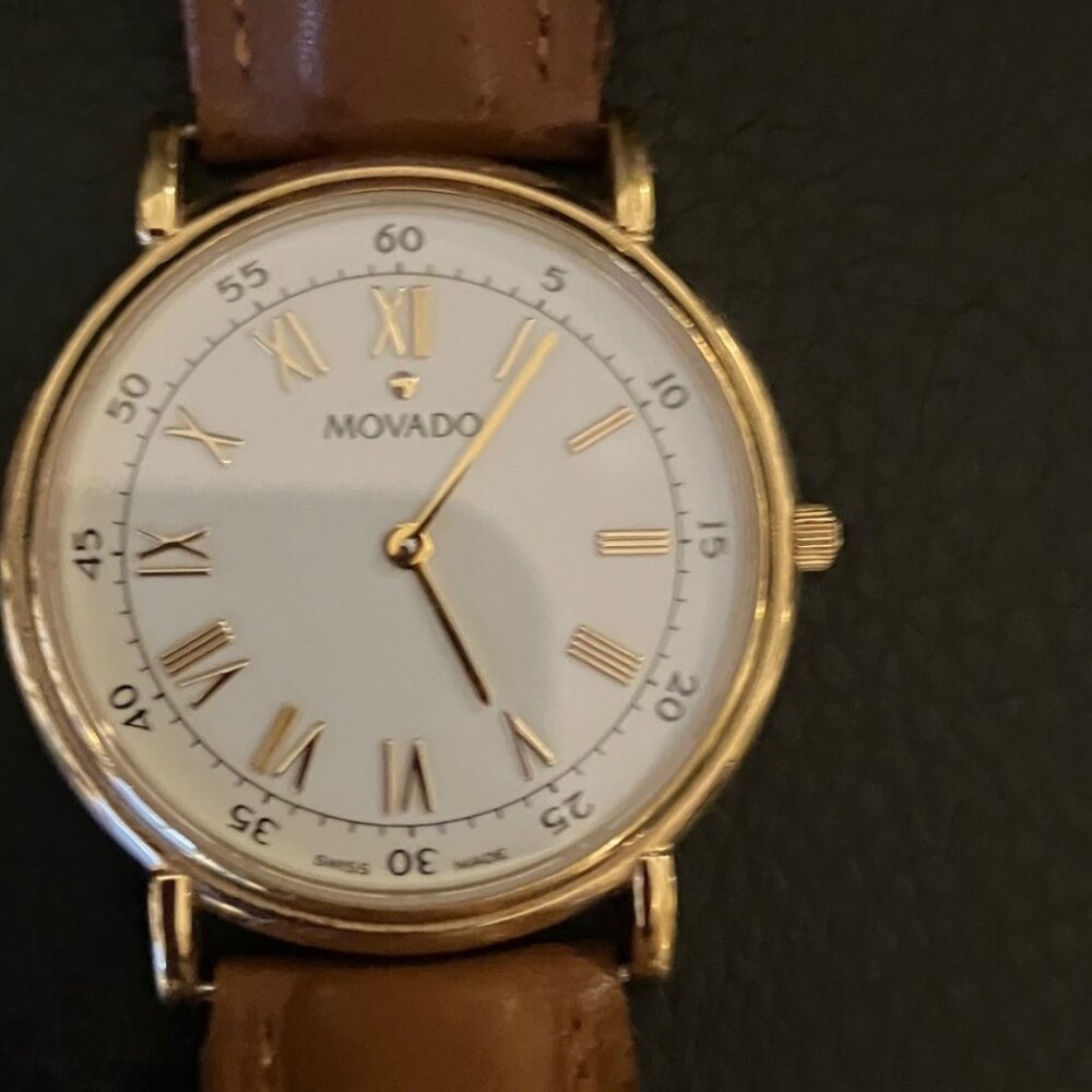 Movado Men's stainles steel back water resistant sapphire crystal watch